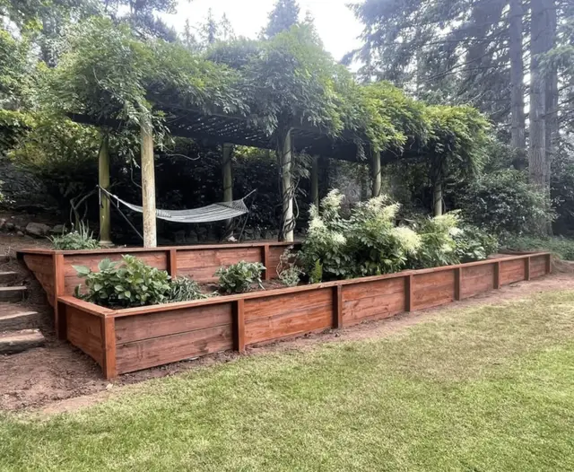 Pergola garden retreat with custom raised planter beds in West Linn OR – Oregon Quality Cuts