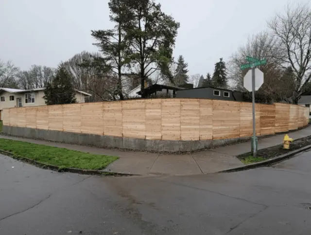 Large perimeter cedar privacy fence along corner lot in Wilsonville OR – Oregon Quality Cuts