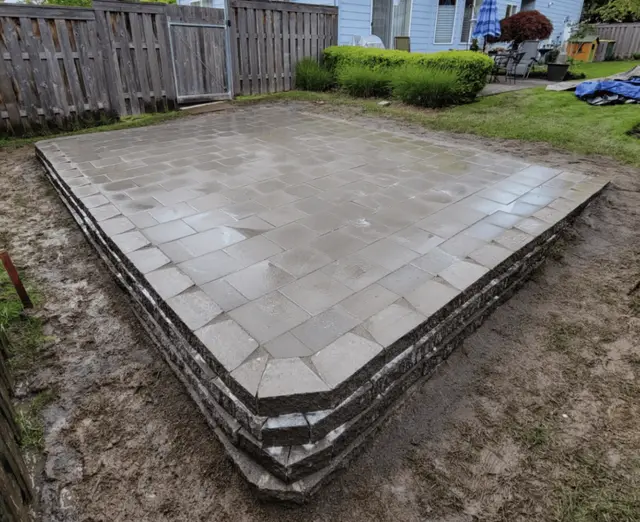 Raised paver patio installation for backyard entertaining in Tigard OR – Oregon Quality Cuts